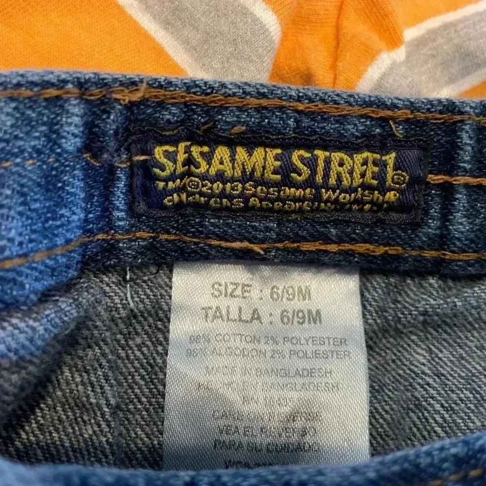 Sesame Street 6-9 months orange striped long sleeve lion shirt and jeans outfit​
